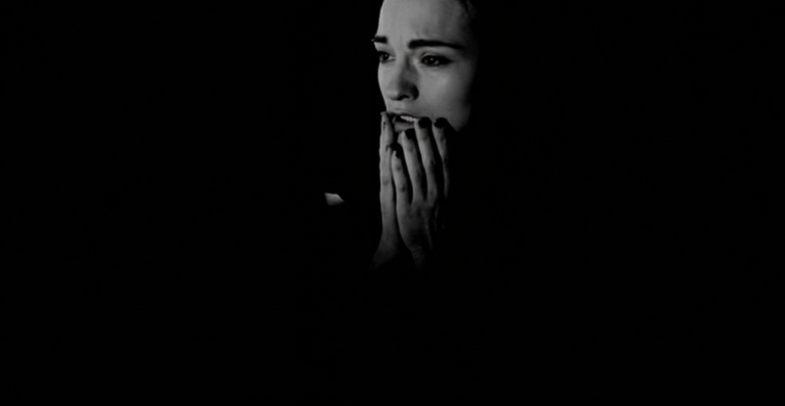 Elina Löwensohn in Nadja (1994), lit against deep shadow